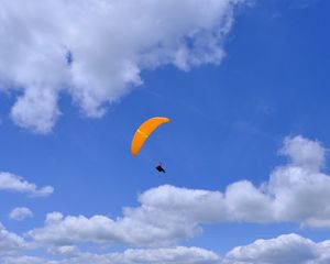 Preview wallpaper parachutist, parachute, sky, clouds