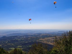 Preview wallpaper parachutists, mountains, height, flight