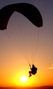 Preview wallpaper paraglider, flight, silhouette, man, sky