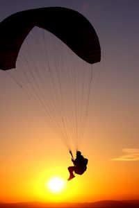 Preview wallpaper paraglider, flight, silhouette, man, sky