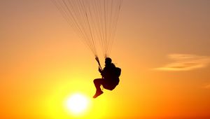 Preview wallpaper paraglider, flight, silhouette, man, sky