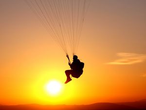 Preview wallpaper paraglider, flight, silhouette, man, sky