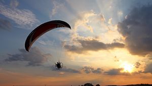 Preview wallpaper paraglider, flight, sky, sunset