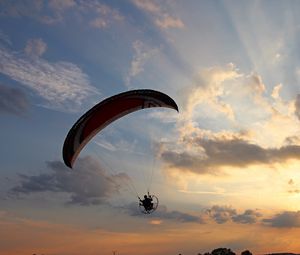 Preview wallpaper paraglider, flight, sky, sunset