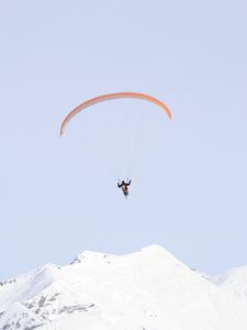 Preview wallpaper paraglider, man, flight, mountains, minimalism