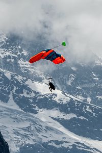 Preview wallpaper paraglider, parachute, mountains, snow, snowy