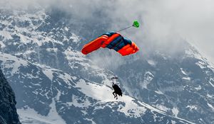 Preview wallpaper paraglider, parachute, mountains, snow, snowy