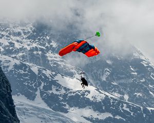 Preview wallpaper paraglider, parachute, mountains, snow, snowy