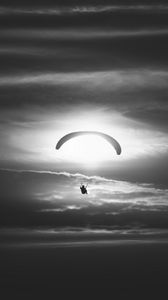 Preview wallpaper paraglider, silhouette, sky, flight, black and white