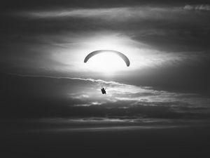 Preview wallpaper paraglider, silhouette, sky, flight, black and white