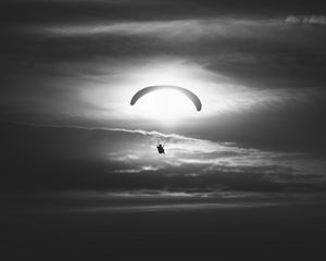 Preview wallpaper paraglider, silhouette, sky, flight, black and white