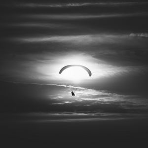 Preview wallpaper paraglider, silhouette, sky, flight, black and white