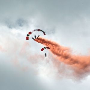 Preview wallpaper paraglider, smoke, flight, sky