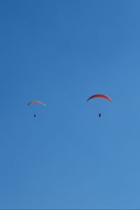 Preview wallpaper paragliders, sky, minimalism, flight