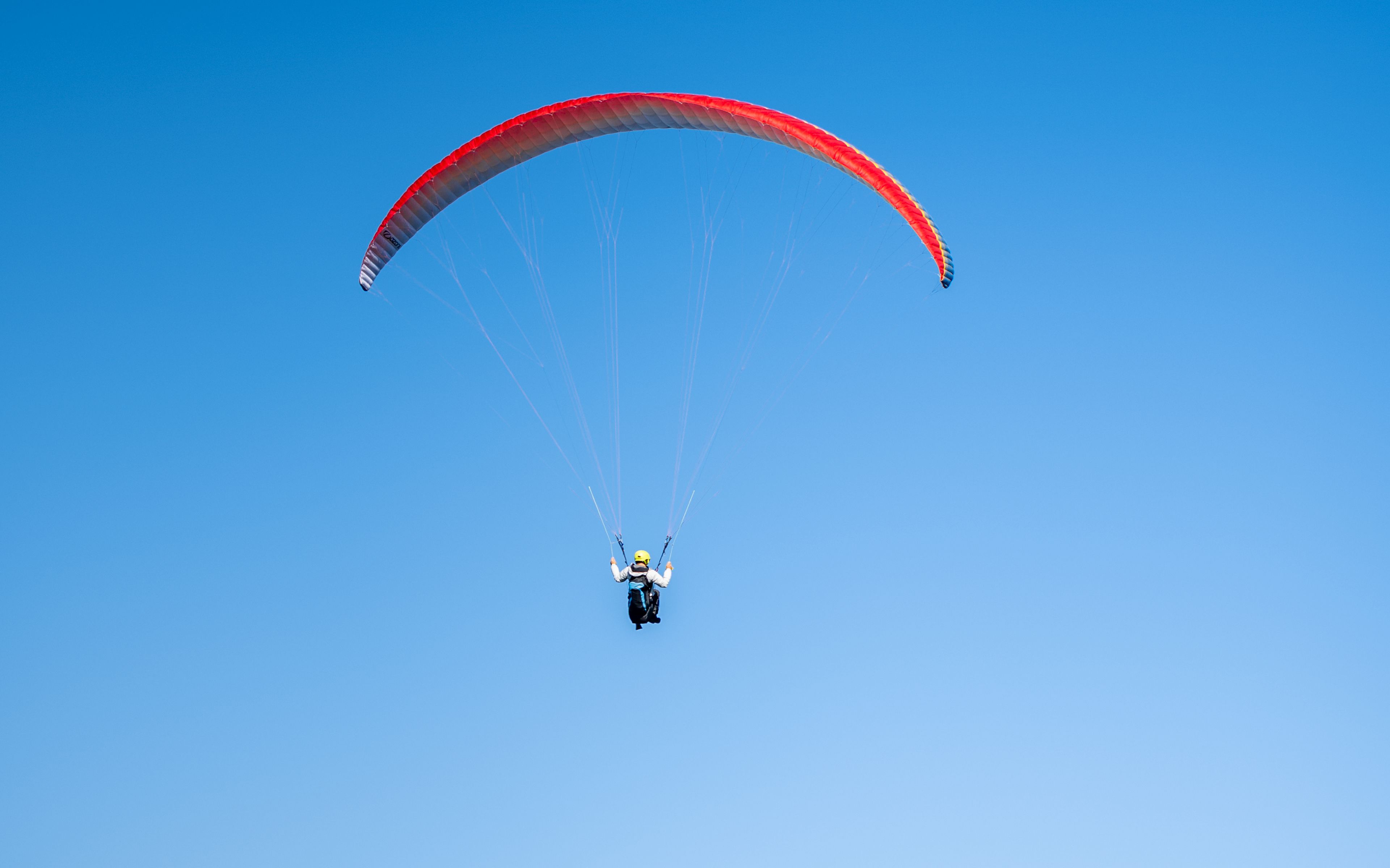 Download wallpaper 3840x2400 paragliding, flight, buildings, sea, city ...