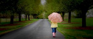 Preview wallpaper park, umbrella, tree, road, walking, cloudy