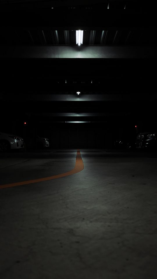 540x960 Wallpaper parking, cars, lamps, glow, dark