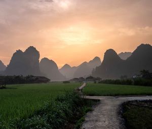 Preview wallpaper path, mountains, field, grass, sunrise