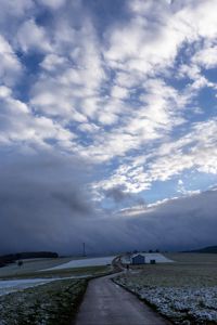 Preview wallpaper pathway, field, clouds, snow, winter, forest, house