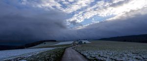 Preview wallpaper pathway, field, clouds, snow, winter, forest, house