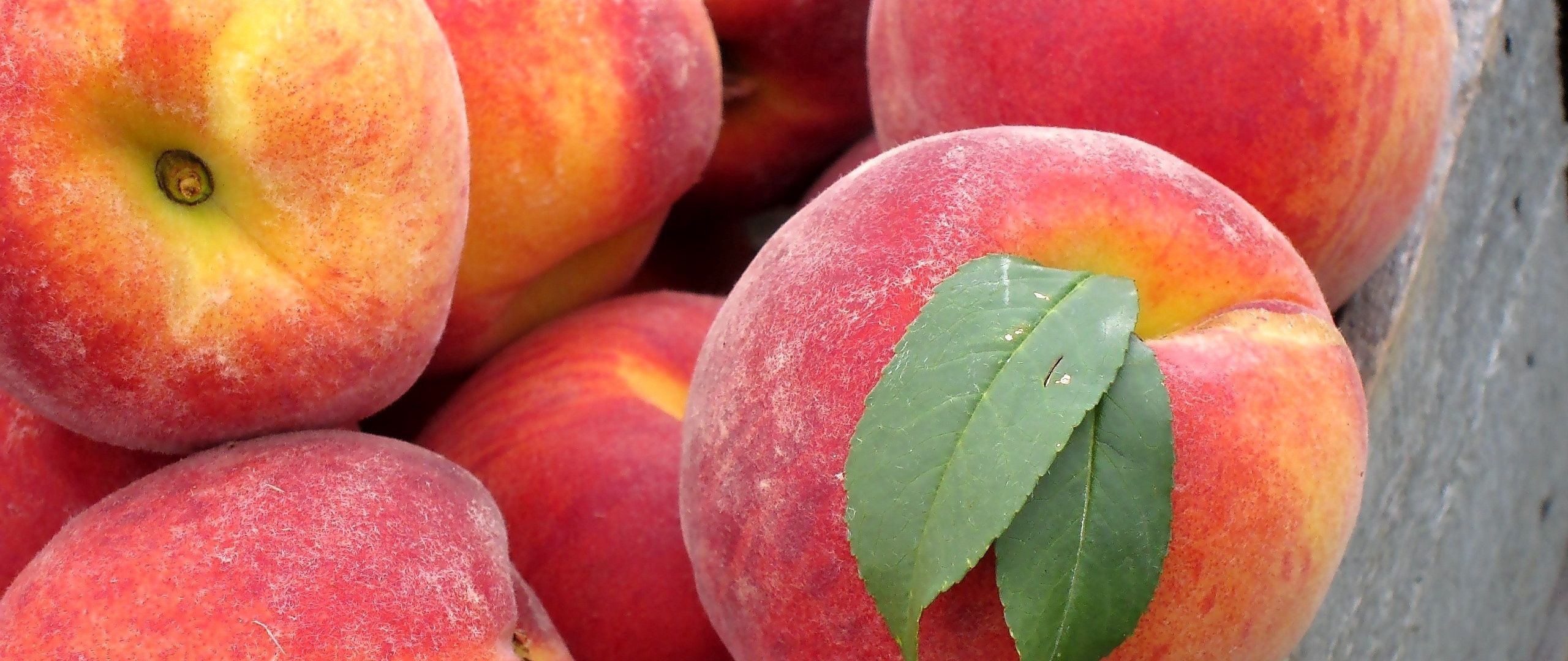 Download wallpaper 2560x1080 peach, leaves, fruit dual wide 1080p hd ...