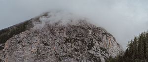 Preview wallpaper peak, mountain, fog, stone, trees