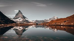 Preview wallpaper peak, mountain, lake, reflection, rocks
