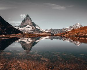 Preview wallpaper peak, mountain, lake, reflection, rocks