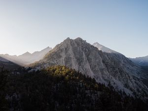 Preview wallpaper peak, mountain, trees, forest, sky