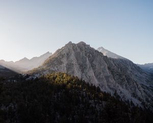 Preview wallpaper peak, mountain, trees, forest, sky