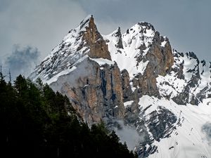 Preview wallpaper peak, mountains, gorge, forest, snowy, switzerland