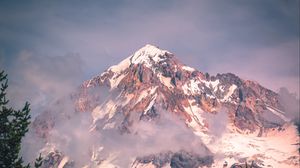 Preview wallpaper peak, mountains, snow, snowy, fog