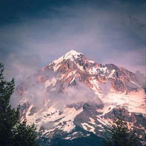 Preview wallpaper peak, mountains, snow, snowy, fog