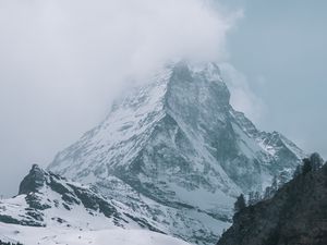 Preview wallpaper peak, rocks, trees, snow, snowy