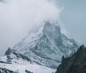 Preview wallpaper peak, rocks, trees, snow, snowy