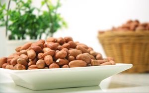 Preview wallpaper peanuts, nuts, plate
