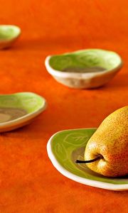 Preview wallpaper pear, plates, fruit, orange