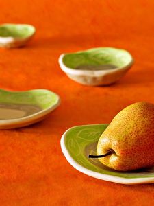 Preview wallpaper pear, plates, fruit, orange