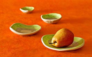 Preview wallpaper pear, plates, fruit, orange