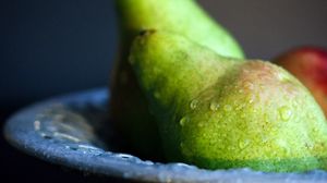 Preview wallpaper pears, fruit, drops, plate, macro