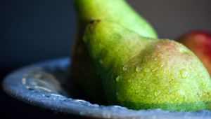 Preview wallpaper pears, fruit, drops, plate, macro