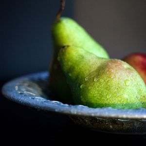 Preview wallpaper pears, fruit, drops, plate, macro