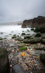 Preview wallpaper pebbles, stones, sea, fog, rocks