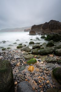 Preview wallpaper pebbles, stones, sea, fog, rocks