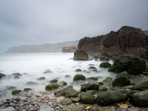 Preview wallpaper pebbles, stones, sea, fog, rocks