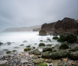 Preview wallpaper pebbles, stones, sea, fog, rocks