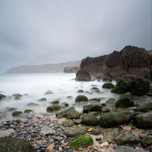 Preview wallpaper pebbles, stones, sea, fog, rocks