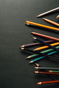 Preview wallpaper pencils, multicolored, black, surface