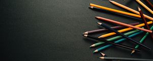 Preview wallpaper pencils, multicolored, black, surface