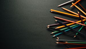 Preview wallpaper pencils, multicolored, black, surface